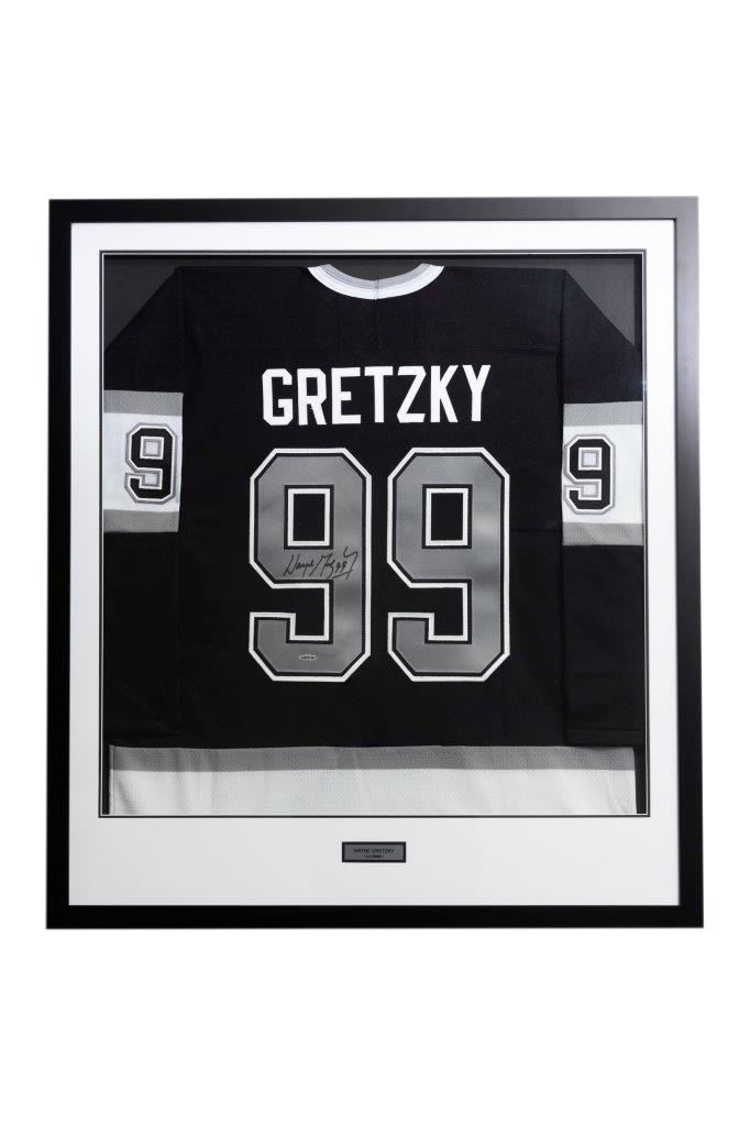 Custom framed hockey jersey on display in Richmond, BC – framing a jersey near me. Jersey framing