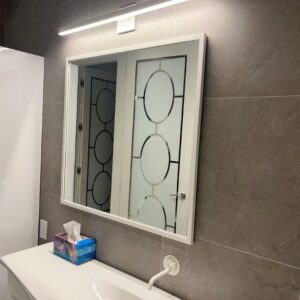 custom mirror framing in Vancouver bathroom
