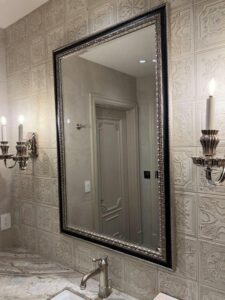 dark coloured mirror frame with clean finish